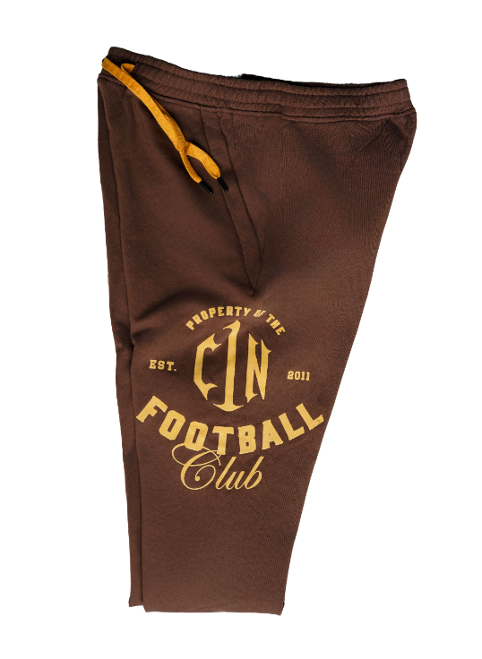 Bless the Babies "Property of Football" Stacked Sweatpants — "The BTB Chocolate Gold" | 2026 C1N Collection