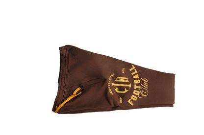 Bless the Babies "Property of Football" Stacked Sweatpants — "The BTB Chocolate Gold" | 2026 C1N Collection